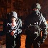 Под Киевом вооруженные отец и сын забрали у водителя автомобиль (видео)