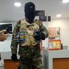 Тримав 12 чоловік у заручниках: у Грузії затримали захоплювача банку