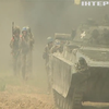 Зі стріляниною, вибухами та в багнюці: як тренують українських військових