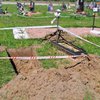 Під Києвом вандал викопав тіло на цвинтарі та підкинув сусіду (фото)
