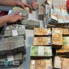 ДБР та СБУ викрили чиновників, які привласнили 64 мільйона на закупівлі техніки для війська