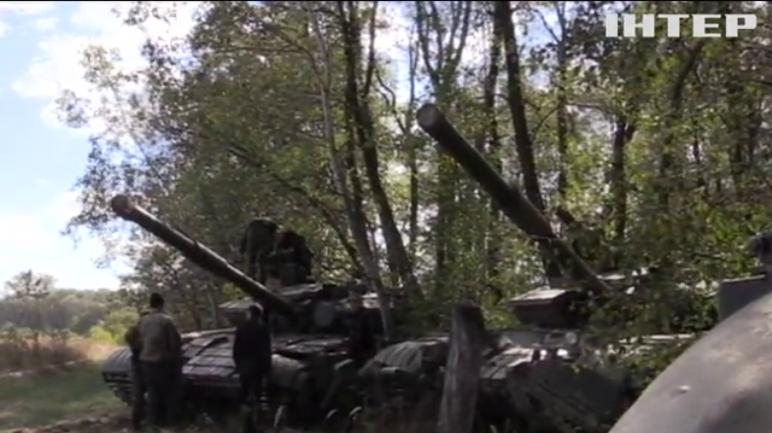 Под Луганском завершили отвод танков с передовой