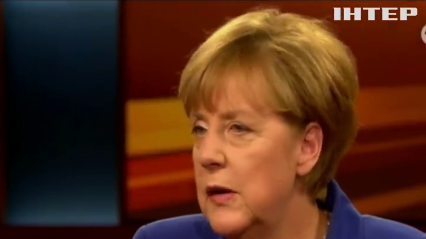 Меркель обещает Германии справиться с наплывом беженцев