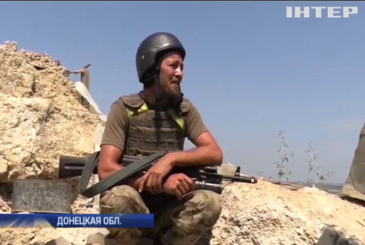 Под Докучаевском враг пытается выбить военных с высоты