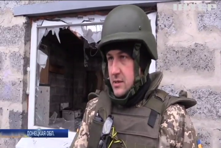 Боевики обстреливают жилые дома в поселке Луганское