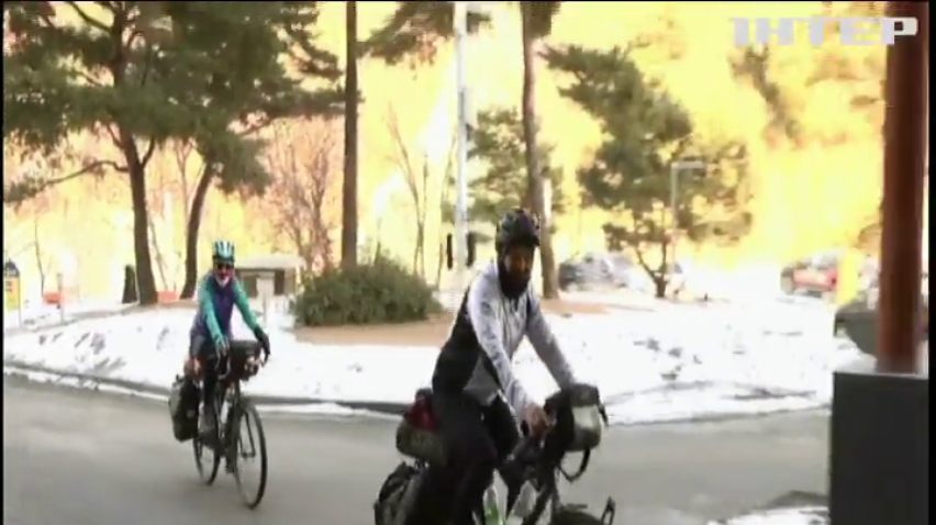 Велосипедом через Євразію: батьки олімпійця прибули підтримати сина на "Олімпіаді-2018"
