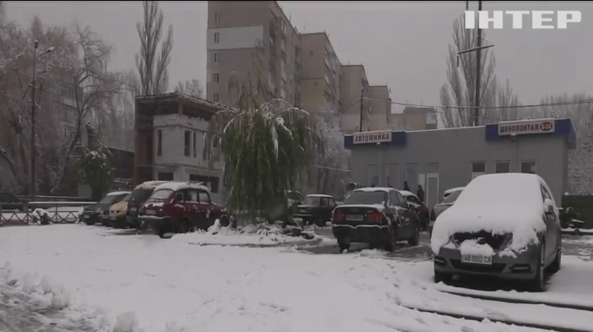 Україну накриє дощем та мокрим снігом