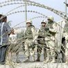 Шесть солдат коалиции издевались над иракскими заключенными