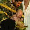 В Институте нейрохирургии крестили пятимесячного Богдана Колосова