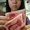Китай ревальвировал юань