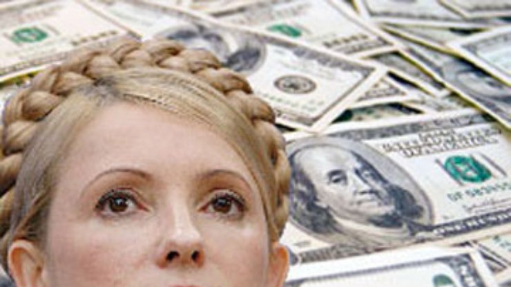 Тимошенко требует от НБУ дать людям дешевый доллар