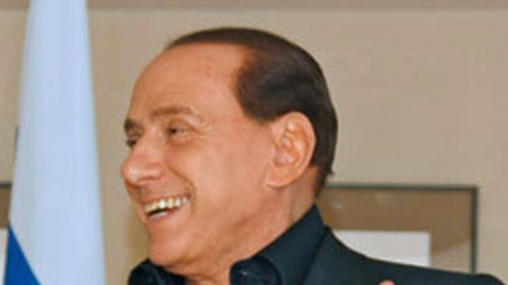 Берлускони предлагает победить кризис шопингом