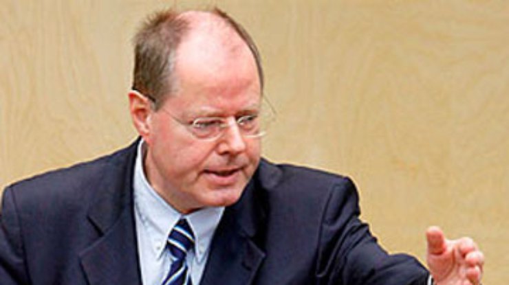Берлин назвал антикризисную политику Лондона "примитивной"