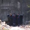 В бомбоубежище погибли двое детей и милиционер