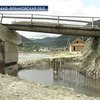 Спустя год после потопа не могут восстановить мосты