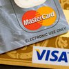 АМКУ взялся за Visa и MasterCard