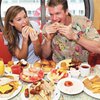 Любителям фаст-фуда поможет апельсиновый сок