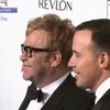 Элтон Джон с мужем усыновили ребенка