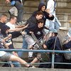 Сразу 14 футбольных фанатов осуждены за убийство французкого болельщика