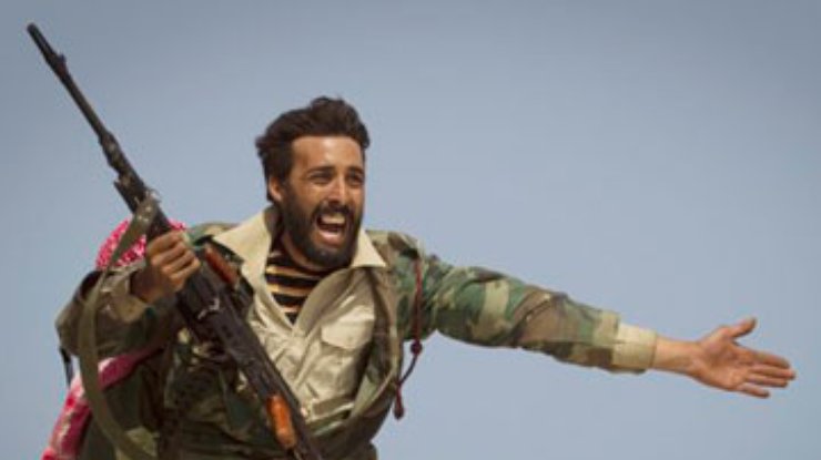 Ливийские повстанцы обещают сдать оружие, когда в Ливии будет порядок