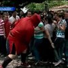 Сальвадорцы разыгрывают на улицах битвы добра и зла