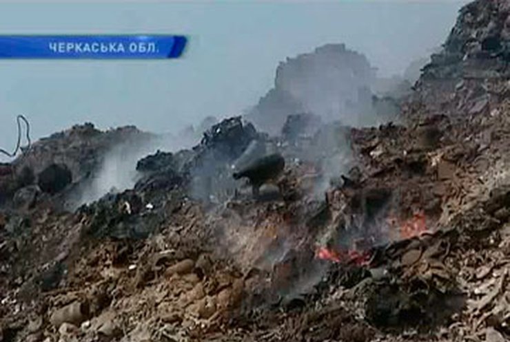 Жители Умани страдают от тлеющего мусорного полигона
