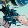 Американцы удивили мир полетом на шезлонге с тремя сотнях воздушных шариков