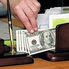 За освещение помещения у предпринимателя вымогали три тысячи долларов