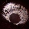 На Николаевщине девочка на санках упала в канализационный колодец
