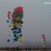 Житель ЮАР пролетел над океаном на воздушных шариках