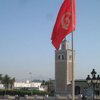 Исламисты в Тунисе передают власть временному кабинету