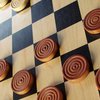 Пьяный пенсионер забил телевизором партнера по шашкам