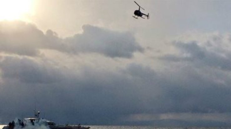 Олимпийский факел погрузили на дно Байкала