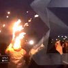 Олимпийский огонь зажег шапку факелоносцу
