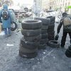 Активисты потушили шины на Грушевского