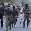 Террористы захватили главный офис компании Ахметова, Нацбанк и налоговую в Донецке