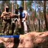 В лесах Славянска нашли шприцы, трамадол и десятки могил безымянных террористов (видео)
