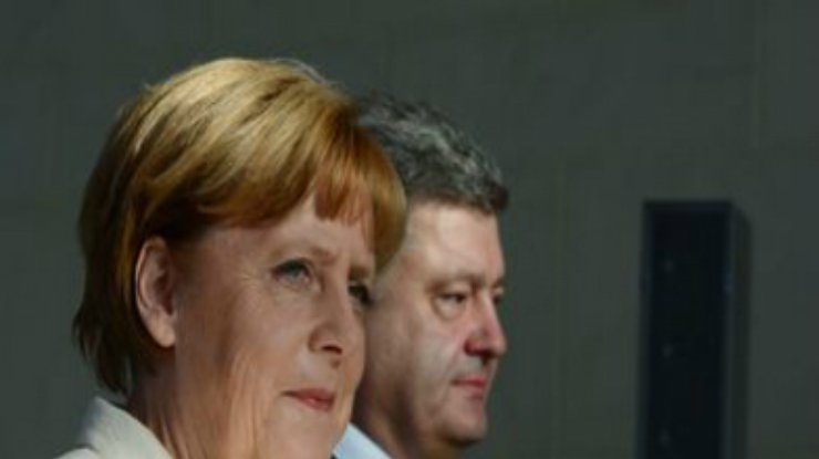 Меркель заявила Порошенко, что ее слова о прямых переговорах с террористами неверно истолковали