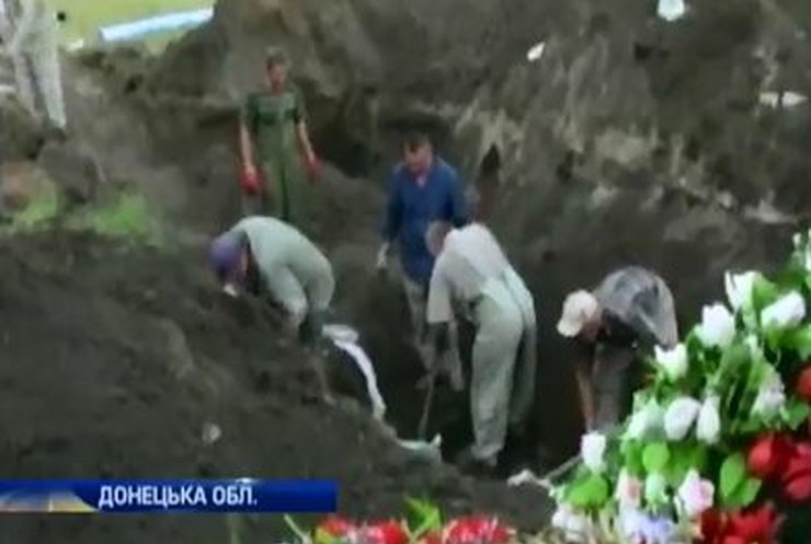 Масові поховання убитих терористами людей можуть спричинити епідемії на Донбасі