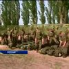 Мир в кадре: Россия усиленно шьет берцы, а США спасает мир от лихорадки Эболы
