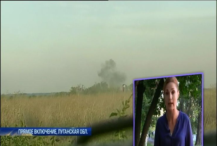 В Луганске террористы осбтреливают жилые дома со стадиона (видео)