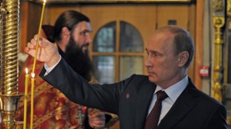 Путин поставил свечку за пострадавших "защитников Новороссии"