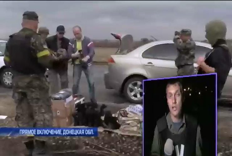 Школьники Мариуполя учатся прятаться от бомбежки в подвал (видео)