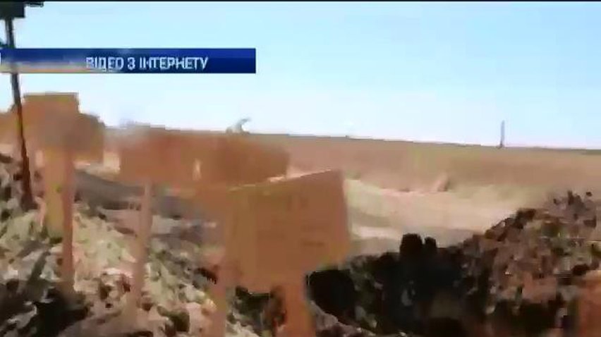 Біля Луганського аеропорту знайшли масові поховання