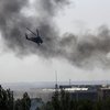 В Донецке "Градами" и минометами штурмуют аэропорт: горит девятиэтажка (обновлено, фото)