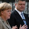 Меркель потребовала полного отвода войск России из Украины