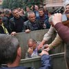 В Черновцах бросили в мусорный бак главврача госпиталя ветеранов войны Манолия Мигайчука (видео)