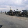 Россия стягивает замаскированные танки и БТРы на границу с Херсонской областью