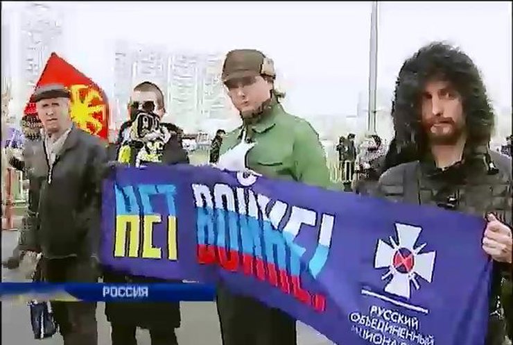 На "Русском марше" в Москве скандировали "Слава Украине" и ждали Гиркина