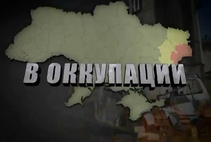 В Луганске террористы оружие нацеливают на жителей